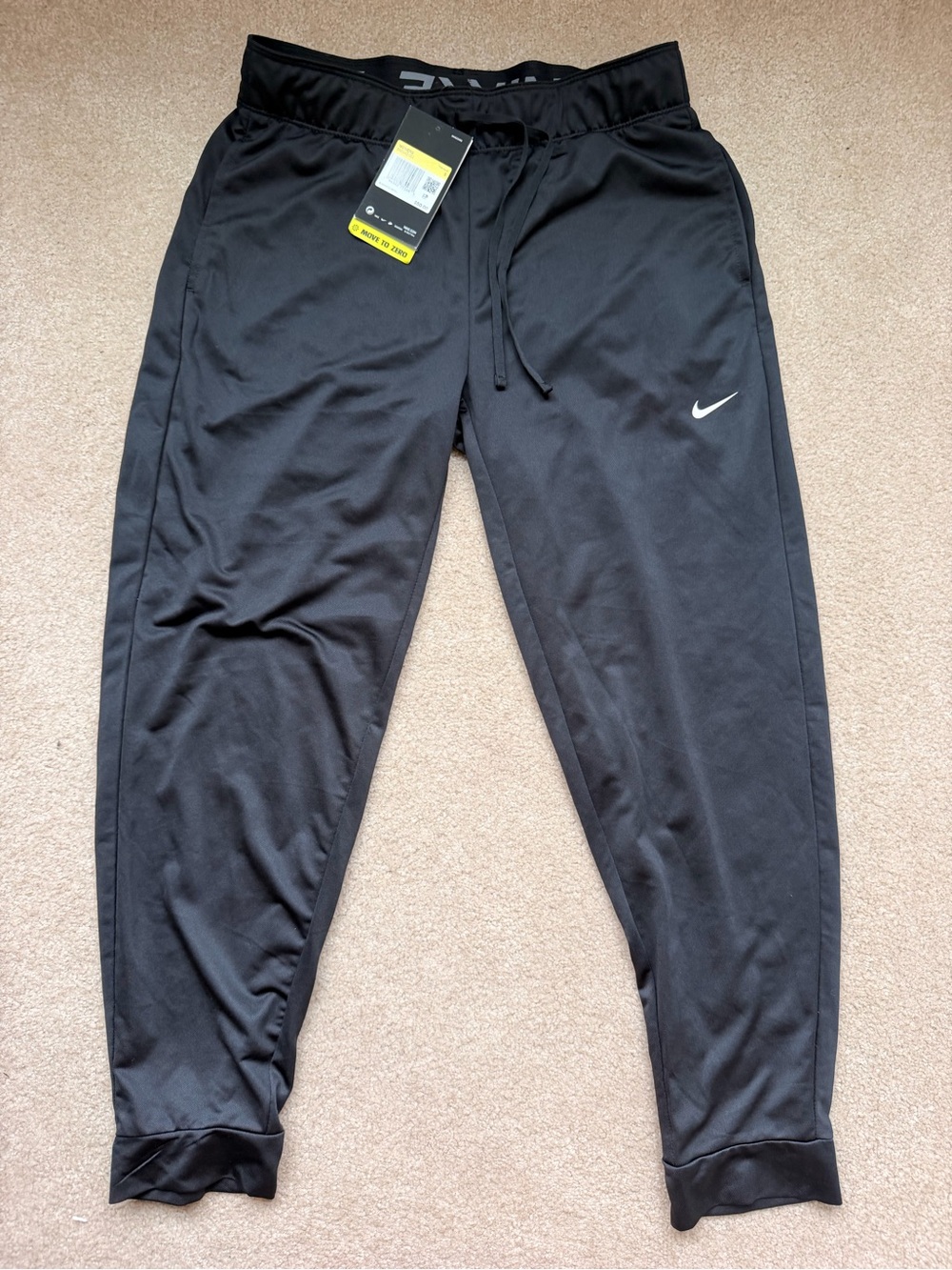Nike Black Jogger Pants with White Swoosh Accent